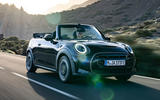 Mini Cooper SE Convertible front three quarter tracking
