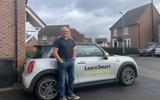 Mike Nunn teaches pupils in a Mini E, having first bought a Renault Zoe