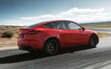 Tesla Model Y on the road red