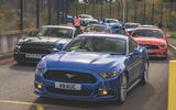Mustangs parked ourside MUstang day