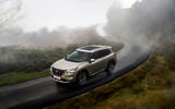 Nissan X Trail 2022 front quarter tracking rain Nissan X Trail 2022 front quarter tracking rain