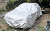 Peugeot 205 GTI under cover