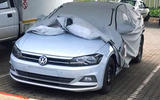 Volkswagen Polo with cover partly on