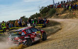 The Polo R5 competing in a rally event - rear 3/4