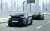 Porsche 911 hybrid prototype testing in city
