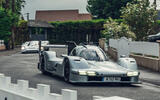 Porsche 963 RSP driving on street with 917 front quarter tracking Porsche 963 RSP driving on street with 917 front quarter tracking