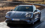 Porsche Taycan GTS Sport Turismo front quarter tracking Porsche Taycan GTS Sport Turismo front quarter tracking