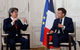 Prologium Vincent Yang L speaks President Emmanuel Macron R