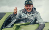 rhys millen celebrates breaking pikes peak hill climb production car record in continental gt