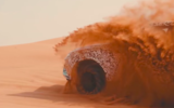 Lamborghini Urus on sand