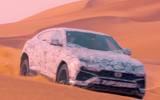 Lamborghini Urus on sand