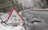 Snowy road with pothole Snowy road with pothole