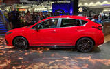 Subaru Impreza on display in los angeles red left side