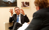 PSA chairman Carlos Tavares talks to Autocar