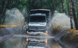 Unimog driving through water splash JH Unimog driving through water splash JH