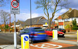 20mph speed limit sign on busy road 20mph speed limit sign on busy road