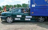 X type under lorry