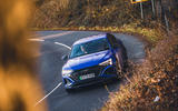 Audi SQ8 E tron front through trees Audi SQ8 E tron front through trees