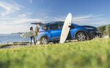 Dacia Jogger blue skies and surfboard