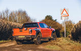 Ford Ranger Raptor at a ford sign