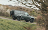 Land Rover Defender 130 side from distance Land Rover Defender 130 side from distance