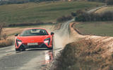 McLaren Artura through puddles
