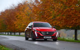 Peugeot 308 front with orange trees Peugeot 308 front with orange trees