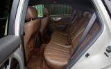 Considering the FX’s exterior dimensions, room in the rear is particularly tight Infiniti FX rear seats