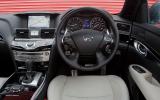 Touch screen is too far away; you can also control all functions via the scroll wheel below Infiniti M dashboard
