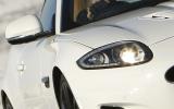 XK is attractive, even muscular from some angles, but conservative overall Jaguar XK xenon headlights