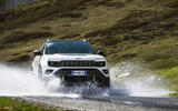 Jeep Avenger 4xe 2025 Review front corner water splash 15 Jeep Avenger 4xe 2025 Review front corner water splash 15