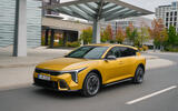 kia k4 gtline sparkling yellow dynamic highres 001