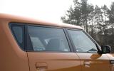 Roof header rail is unusually  bluff, helping to provide plentiful head room and a quasi-military vehicle look Kia Soul rear doors