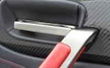 Everything you touch is made of premium materials Lexus LFA doorhandle