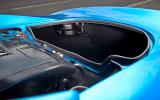 Behind the engine, there’s space for a couple of soft bags along with the roof Lotus Elise boot space
