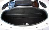 Small boot, aft of the mid-mounted V6, will take soft bags for weekends away Lotus Evora boot space