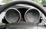 Dials are easy to read. Secondary information is displayed centrally in the dash Mazda 3 instrument cluster