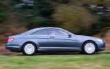 A flex of the right foot is enough to haul the CL convincingly past slower traffic Mercedes-Benz CL side profile