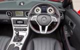 The cockpit is full of brushed aluminium switches and vents which show Mercedes premium status Mercedes-Benz SLK dashboard