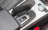 The button to operate the roof is hidden beneath a hinged cover on the centre console Mercedes-Benz SLK roof control button