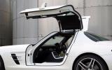 A spectacular feature. Mind your head and that big sill as you climb in, though Mercedes-AMG SLS gullwing doors