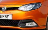 A large black honeycombe grille and solid foglight surrounds dominate the front end MG6 front foglights