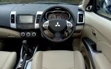 Decent size and rim thickness, brightened by metal inserts (even if they’re a bit plasticky). But why no reach adjustment?  Mitsubishi Outlander dashboard