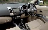 Cabin finish varies, with brittle plastics on the bits you touch Mitsubishi Outlander interior