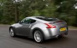 When we compared it with a Porsche Cayman in a straight line, the Porsche, in real-world terms, failed to keep up Nissan 370Z rear quarter