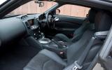 Just two seats, each with a low-slung, legs-stretched position. Decent space though Nissan 370Z interior