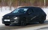 New Peugeot 508 estate spied