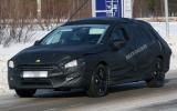 New Peugeot 508 estate spied