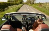 Forward cabin is a nice place to be, rear seats are properly limited in space for adults and children Driving Peugeot 308 CC roof down