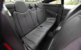 Adults won’t like it in the back. The small seats are upright and space is tight Peugeot RCZ rear seats